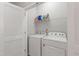 Functional laundry room equipped with a washer and dryer, providing convenience for daily chores at 321 Everly Mist Way, Wake Forest, NC 27587