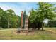 Sign for E. Carroll Joyner Park, located on Harris Road, next to lush trees at 321 Everly Mist Way, Wake Forest, NC 27587