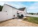 Charming patio with a dining set, perfect for outdoor entertaining and relaxation at 321 Everly Mist Way, Wake Forest, NC 27587