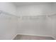 Walk-in closet with carpet and wire shelving for storage at 3224 Wishing Well Wynd, Apex, NC 27502