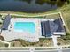 A vibrant community pool with clear water, lounge chairs, and manicured landscape for residents to unwind at 3224 Wishing Well Wynd, Apex, NC 27502