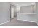 Upstairs hallway with neutral paint, carpet, white trim and doors and recessed lighting at 3224 Wishing Well Wynd, Apex, NC 27502
