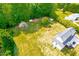 Overhead view of backyard with green lawn and landscaping at 3281 Phillips Chapel Rd, Haw River, NC 27258