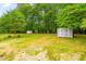 Spacious backyard with a storage shed and plenty of room for recreation and relaxation at 3281 Phillips Chapel Rd, Haw River, NC 27258