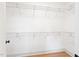 Spacious walk-in closet with multiple shelves providing ample storage space and organization at 3281 Phillips Chapel Rd, Haw River, NC 27258