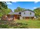A charming backyard with a deck offers a blend of relaxation and entertainment at 3425 Brentwood Rd, Raleigh, NC 27604