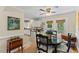 Eat-in kitchen shows a view of the seating and the outside at 3425 Brentwood Rd, Raleigh, NC 27604