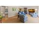 Open-concept living room showing comfortable seating and a view into other parts of the home at 3425 Brentwood Rd, Raleigh, NC 27604