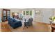 Cozy living room with plush seating, large windows, and elegant decor at 3425 Brentwood Rd, Raleigh, NC 27604