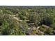 This aerial view showcases a quiet neighborhood filled with mature trees and well-maintained homes at 3501 Arrowwood Dr, Raleigh, NC 27604