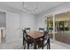 Dining room with sliding door access to an outdoor area, adjacent to doorway at 3501 Arrowwood Dr, Raleigh, NC 27604