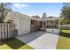Backyard featuring a screen porch, paved area and a large lawn at 3501 Arrowwood Dr, Raleigh, NC 27604