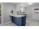 Well-lit kitchen with white cabinets, modern countertops, and stainless steel sink at 3501 Arrowwood Dr, Raleigh, NC 27604