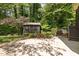 A view of the back yard with an outdoor kitchen at 3612 Carriage Dr, Raleigh, NC 27612