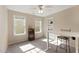 Bright room with two windows, a work desk, and natural light at 3612 Carriage Dr, Raleigh, NC 27612