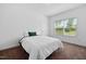 Cozy bedroom featuring a comfortable bed, soft carpet, and bright natural light for a relaxing atmosphere at 380 Perdues Rd, Louisburg, NC 27549