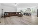 Open living room and kitchen area featuring recessed lighting and hardwood floors at 380 Perdues Rd, Louisburg, NC 27549