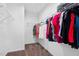 Walk-in closet with shelving and racks offering ample space for clothes, storage, and personal items at 380 Perdues Rd, Louisburg, NC 27549