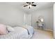 Bright bedroom with a desk, perfect for work or study, features neutral décor at 401 Onondaga Ct, Holly Springs, NC 27540