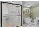 Bathroom showcasing a glass-enclosed shower, soaking tub, and elegant fixtures at 408 Blooming Meadows Rd, Holly Springs, NC 27540