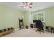 Bedroom featuring a large window, neutral walls, and wood-look flooring at 408 Blooming Meadows Rd, Holly Springs, NC 27540