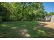 Backyard featuring a lawn and shady trees at 430 Fenton St, Raleigh, NC 27604