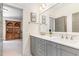 Bathroom with double sinks, quartz countertop and view to the study room at 46 Bonterra Way, Chapel Hill, NC 27516