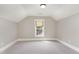 Clean bedroom with neutral carpet and a window providing natural light at 46 Bonterra Way, Chapel Hill, NC 27516