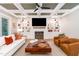 Living room highlighting custom ceiling, fireplace with built-ins, and comfortable seating at 46 Bonterra Way, Chapel Hill, NC 27516