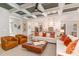 Open living space featuring a fireplace, comfortable seating, and seamless flow to the kitchen at 46 Bonterra Way, Chapel Hill, NC 27516
