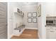 Convenient mudroom with built-in bench, storage, and coat hooks at 46 Bonterra Way, Chapel Hill, NC 27516
