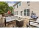 Inviting backyard deck area featuring a fire pit, patio furniture, grill, and outdoor space at 5213 Holly Ridge Farm Rd, Raleigh, NC 27616