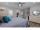 Bedroom featuring a walk-in closet and an ensuite bathroom, offering convenience and privacy at 5402 Shealtiel Way, Rougemont, NC 27572