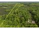 Beautiful wooded land with clearly marked boundary lines for your new home build or investment property at 5402 Shealtiel Way, Rougemont, NC 27572