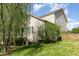 The backyard has a deck overlooking a well-maintained lawn, beautiful landscaping, and a private setting at 5504 Creekdale Cir, Raleigh, NC 27612