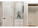 Butler pantry featuring white cabinetry and modern decor at 5504 Creekdale Cir, Raleigh, NC 27612