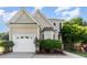 Charming home with a two-car garage, beautiful bay window, and well-manicured landscaping at 5504 Creekdale Cir, Raleigh, NC 27612