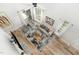 Airy living room with hardwood floors, stylish decor, and plenty of natural light at 5504 Creekdale Cir, Raleigh, NC 27612