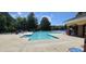 Large community pool with plenty of seating, perfect for relaxing on a hot day at 5504 Creekdale Cir, Raleigh, NC 27612