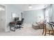 Multi-purpose bedroom with desk, chair, and sitting area for relaxation and productivity at 5512 Bridgeman Ct, Durham, NC 27703
