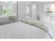 Calming bedroom with neutral decor, large window with view, and ample natural light at 5512 Bridgeman Ct, Durham, NC 27703