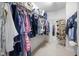 Walk-in closet featuring ample storage space and organized shelving for clothes and accessories at 5512 Bridgeman Ct, Durham, NC 27703