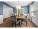 The dining room is lit by a modern chandelier at 5512 Bridgeman Ct, Durham, NC 27703