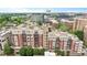 An aerial view of a residential apartment building featuring classic architecture and well-maintained landscaping at 618 N Boylan Ave # 622, Raleigh, NC 27603