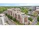 A high-angle view showcases a residential apartment building with a vibrant cityscape backdrop at 618 N Boylan Ave # 622, Raleigh, NC 27603