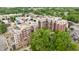 Aerial view of an apartment building featuring a shared pool and beautiful trees at 618 N Boylan Ave # 622, Raleigh, NC 27603