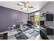 This bedroom features a modern ceiling fan and a door to a balcony at 618 N Boylan Ave # 622, Raleigh, NC 27603