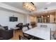 Spacious common room has couches, dining tables, a television, and a kitchen at 618 N Boylan Ave # 622, Raleigh, NC 27603