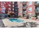 Beautiful red brick building with a serene community pool and inviting outdoor space at 618 N Boylan Ave # 622, Raleigh, NC 27603