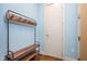 Entryway featuring a custom coat rack with bench and wood floors at 618 N Boylan Ave # 622, Raleigh, NC 27603